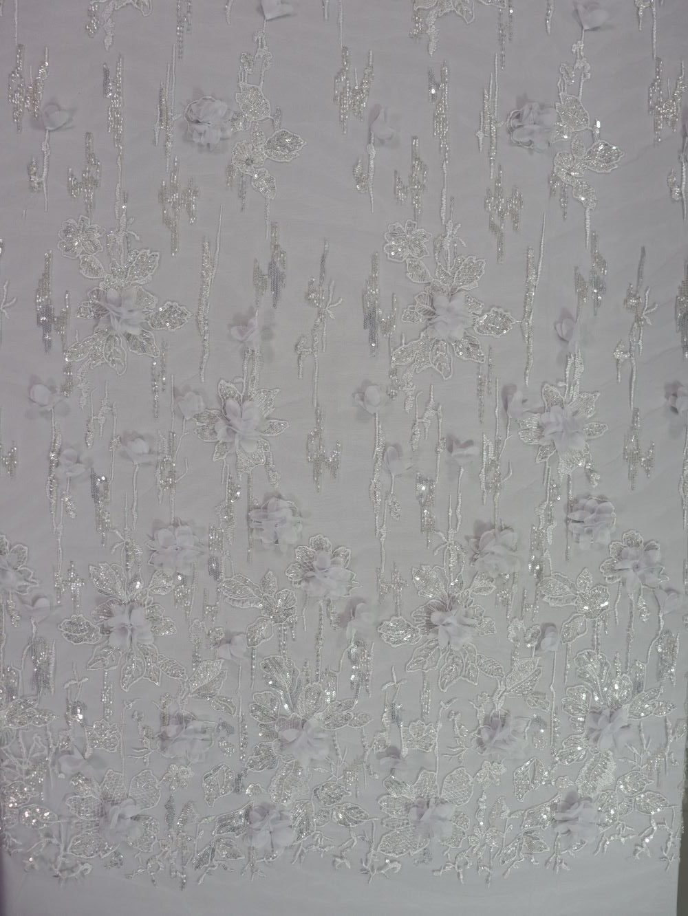 IMG_5875 پارچه گیپور مجلسی گل برجسته سفید طرح شش