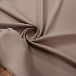 پارچه کرپ سوپر مازراتی (باربی چینی) رنگ کرم نسکافه ای سیر