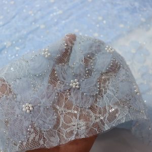 پارچه مجلسی دانتل فرانسه گل حریر برجسته رنگ آبی آسمانی طرح یک سری جدید