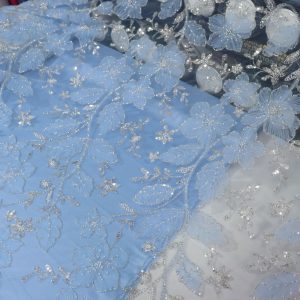 پارچه مجلسی گل حریر برجسته رنگ آبی آسمانی طرح چهار سری جدید