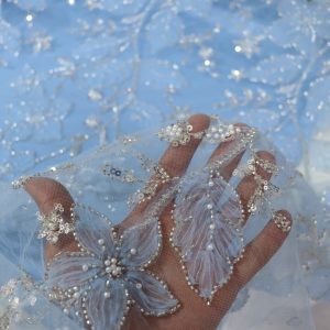 پارچه مجلسی گل حریر برجسته رنگ آبی آسمانی طرح چهار سری جدید