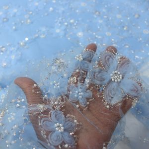 پارچه مجلسی گل حریر برجسته رنگ آبی آسمانی طرح پنج سری جدید