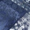 پارچه مجلسی گل حریر برجسته رنگ سرمه ای طرح پنج سری جدید