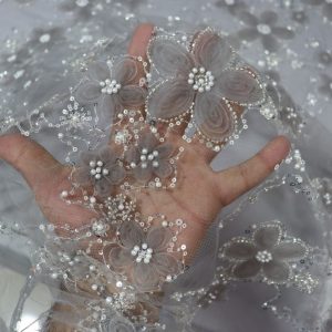 پارچه مجلسی گل حریر برجسته رنگ طوسی طرح پنج سری جدید