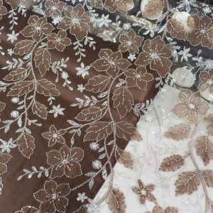پارچه مجلسی گل حریر برجسته رنگ قهوه ای طرح چهار سری جدید